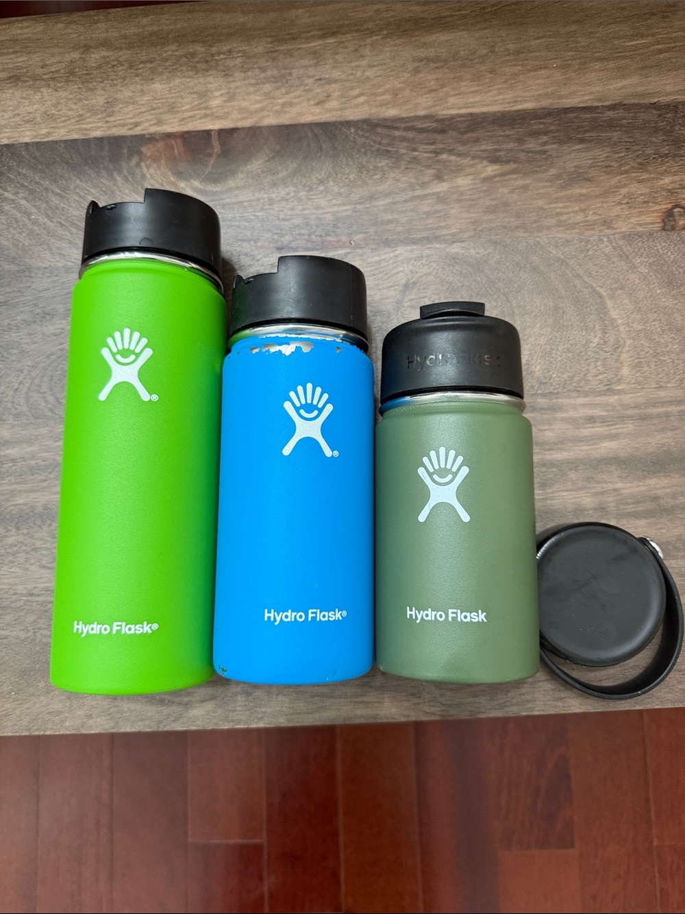 Set of 3 hydro flask bottles and extra top